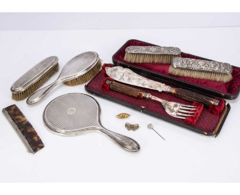 Six Victorian and later dressing table items, together with a cased pair of silver plated fish servers with antler handles, A