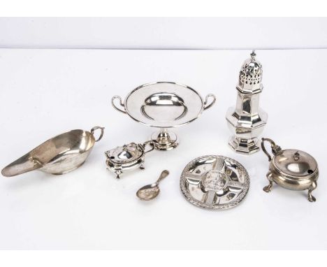 Seven collectable items of silver, including a small twin handled tazza, a sauce boat, a commemorative plaque, two mustards, 
