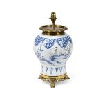 A DUTCH DELFT BLUE AND WHITE VASE, LATER CONVERTED TO A LAMP, CIRCA 1700