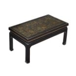 A BLACK LACQUER AND GILT CHINOISERIE DECORATED LOW TABLE, 20TH CENTURY