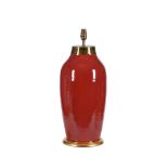 A CHINESE SANG DE BOEUF RED GLAZED PORCELAIN VASE FITTED AS A LAMP, 19TH CENTURY