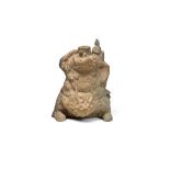 A CHINESE POTTERY FIGURE OF A MYTHICAL BEAST, TANG DYNASTY OR LATER