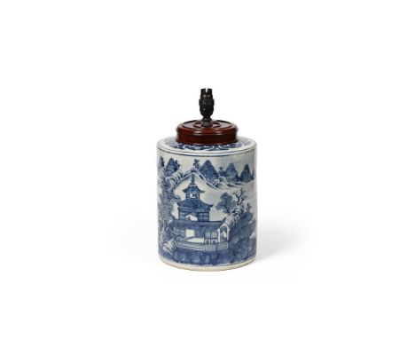 A CHINESE BLUE AND WHITE CYLINDRICAL VASE ADAPTED AS A LAMP  QING DYNASTY, 17TH OR 18TH CENTURY Painted with pagodas in a woo