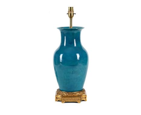 A CHINESE TURQUOISE GLAZED VASE FITTED AS A LAMP 19TH CENTURY Mounted on an ormolu gilt metal base in Louis XVI style approxi