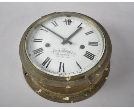 A Vintage Circular Brass Cased Bulkhead Clock with White Enameled Dial Whyte Thomson and Co, Glasgow, 23cms Diameter, No Move