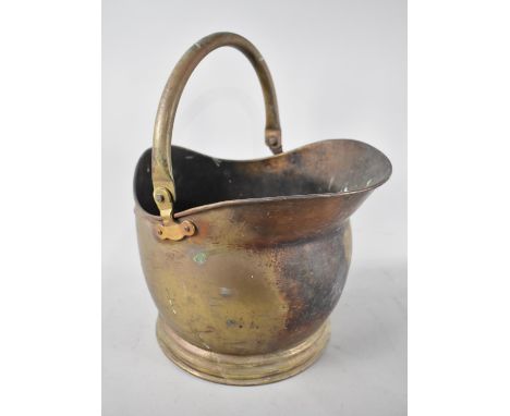 A Vintage Brass Helmet Shaped Coal Bucket 