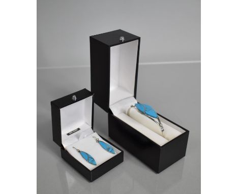 A Silver and Turquoise Style Stone Suite of Jewellery to comprise Bangle and Earrings, having Lozenge Shaped Stones. 