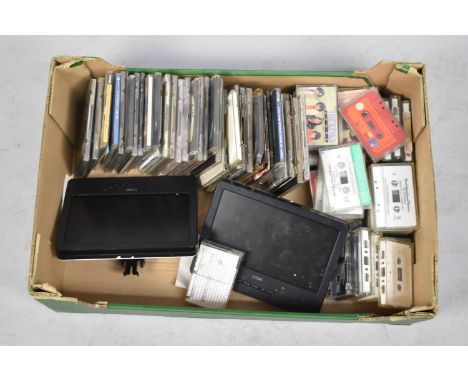 A Collection of Vintage Pre Recorded Cassettes and CD's 