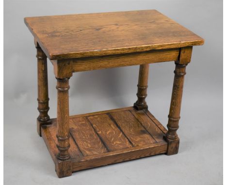 A Mid 20th Century Oak Rectangular Table with Turned Supports and Stretcher Shelf, 54cms Wide 