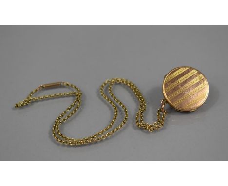 A Gilt 9ct Rose Gold Circular Photo Locket on Chain, Locket with Engine Turned Decoration Opening to Reveal Double Photo Aper