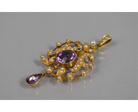 An Early 20th Century 15ct Gold Pendant Mounted with Pearls, Peridot and Amethyst Coloured Stones in the 'Suffragette' Palett