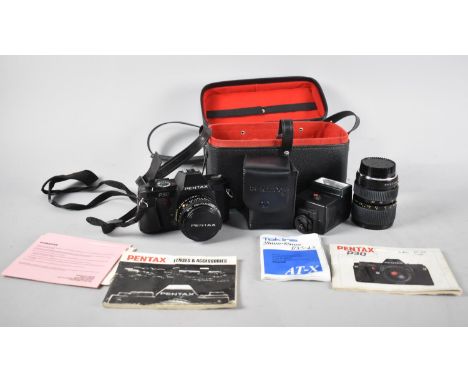 A Cased Vintage Pentax P30 Camera with Telescopic Lens, Flash Unit, Instructions Etc 