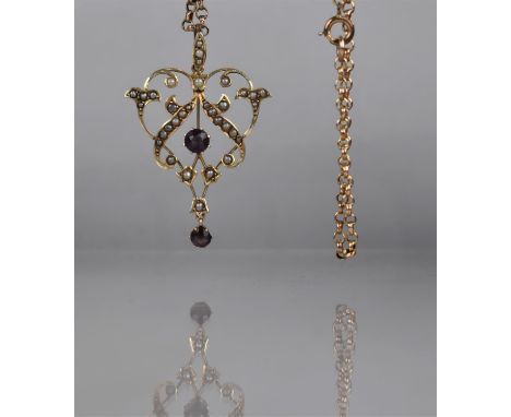 A 9ct Gold Edwardian Purple Stone and Pearl Pendant on a 9ct Gold Belcher Chain. Openwork Foliate Pendant having Central Roun