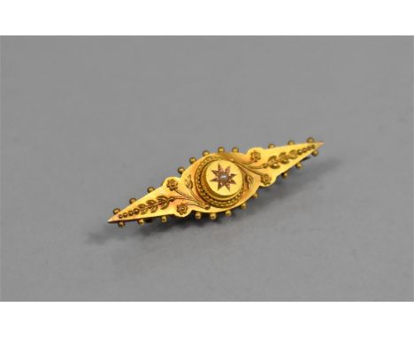 A 15ct Gold and Pearl Victorian Brooch, Sunburst Central Roundel with Seed Pearl, Floral Extended Borders, Makers Mark EB, 40