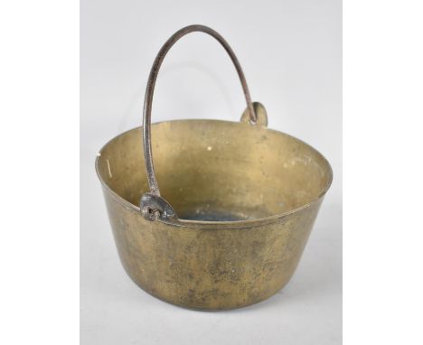A Vintage Brass Jam Kettle with Iron Loop Handle, 28cms Diameter 