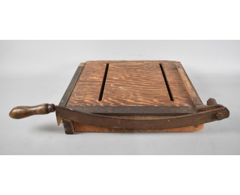 A Vintage Brass Mounted Wooden Guillotine by Dryad, 39cms Wide 