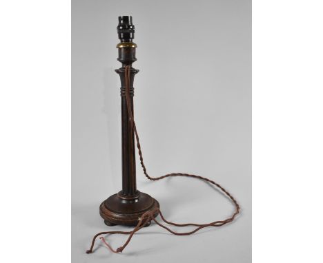 An Edwardian Oak Table Lamp with Reeded Column Support, 42cms High 