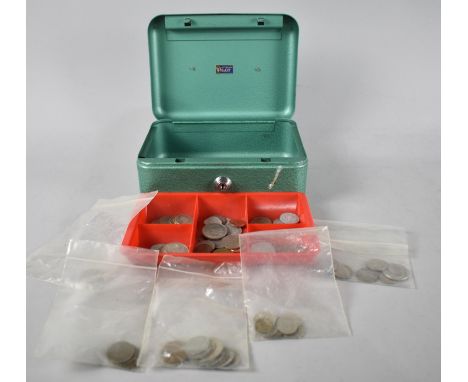 A Vintage Green Cash Tin containing British and Foreign Coins 