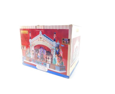 A Lemax Village Collection Nutcracker Suite, set of seven, boxed, together with two plastic Winter tableau bases, and Lemax c