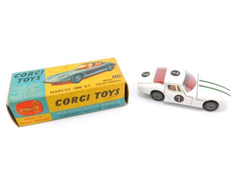 A Corgi die cast Marcos 1800 GT, with Volvo engine, white body work, with number 7 and green bonnet stripes, 324, boxed.