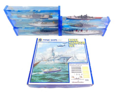 A Minic Ships Naval Harbour Set, scale 1:1200, die cast by Hornby, together with three battleships, comprising the K M Bismar