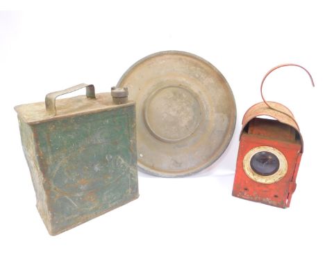 An Esso petrol can with brass cap, railway lantern and galvanised circular stand. (3)