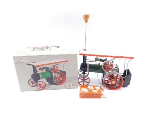 A Mamod Steam Tractor, boxed.