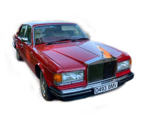 A 1986 Rolls Royce Silver Spirit, D493 BMV, twin carb, five door saloon, 6750cc, in vermilion red, circa 93,389 recorded mile