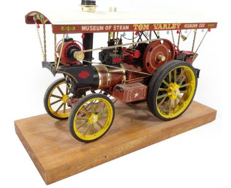 A 20thC scale model traction engine Tom Varley Gasburn steam tractor, on oak plinth, 24cm H, 36cm W, 14cm D.