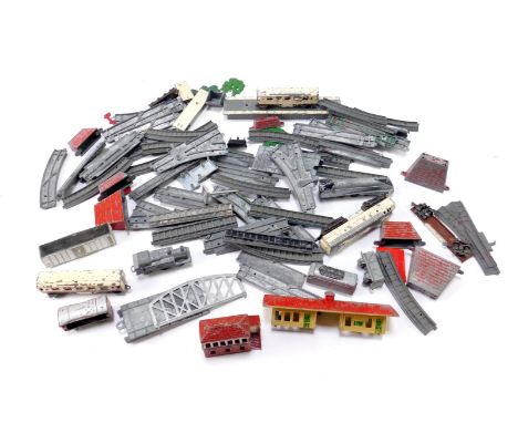 A Lonestar die cast N gauge railway, including a locomotive, coaches, shunting engine, wagons, station, bridge and track, etc