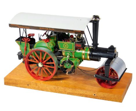 A 20thC scale model traction engine William Hill steam roller, on oak plinth, 24cm H, 36cm W, 15cm D.