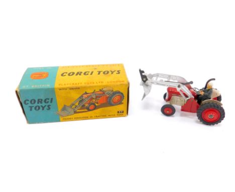 A Corgi die cast Massey Ferguson 65 tractor, with fork and driver, red body, 57, boxed.