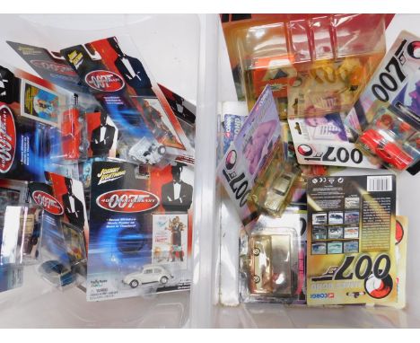 Praying Mantis 007 40th Anniversary Johnny Lighting die cast vehicles, Corgi James Bond vehicles, and sundries, all boxed. (q