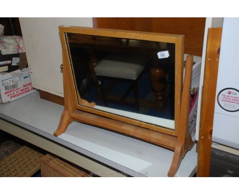 Light oak swing mirror.