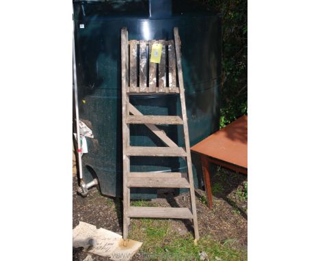 Four rung pair of step ladders