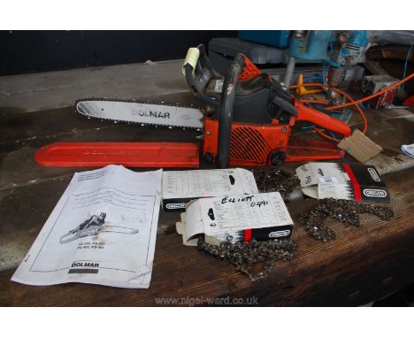 Dolmar PS340 chainsaw with guard and leaflet and three re-sharpened chains