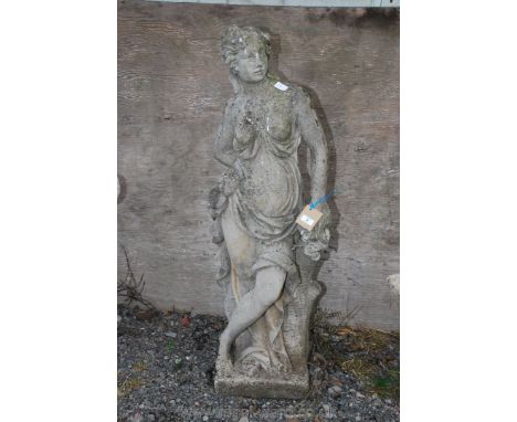 Concrete garden statue of semi clad lady, 47" high (right arm a/f).