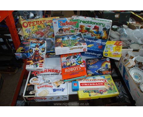 Box of games including Operation, Grand Prix, Nuts &amp; bolts, Twister, Cribbage board etc.