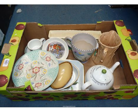 A quantity of china to include Beswick, flower trough, Portmeirion 'Botanic Garden' mug and saucer, Wedgwood Peter Rabbit tea