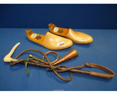 A Hunting whip and a brass and copper hunting horn together with a pair of Mentone shoe trees.