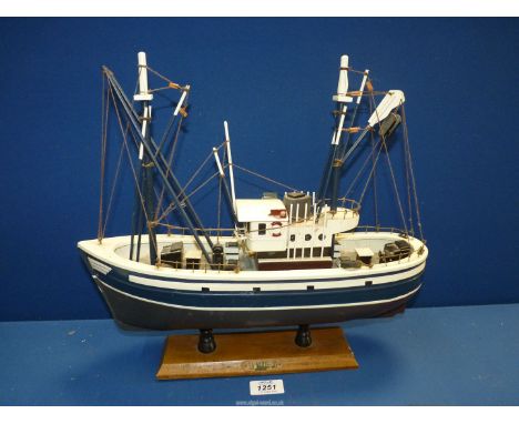 A model of a boat titled "La Marie-Jo", 15 1/2" wide x 14" high.