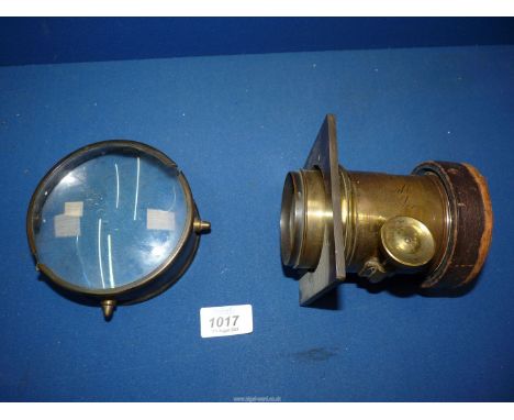 Two Magic Lantern projector lenses; one being brass inscribed with 'A3 Grubbs Dublin 1735'.
