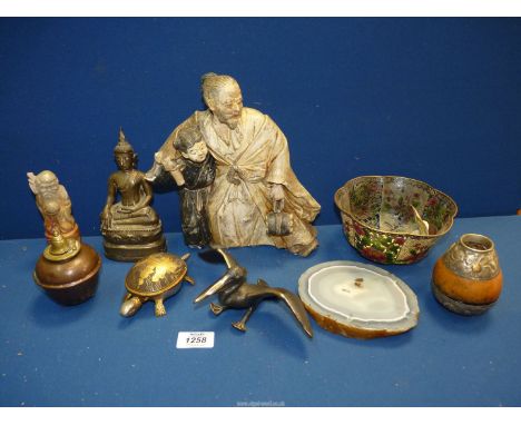 A small quantity of miscellanea to include: Cloisonne bowl (as found), a metal Buddha, unusual copper oil candlestick holder,