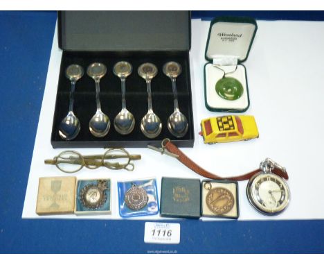 A quantity of miscellanea to include 'Royal Silver Monarch' spoon collection, New Zealand jade necklace, three sporting medal