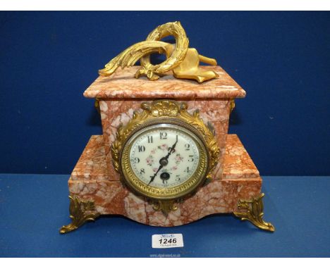 An attractive veined rose marble Mantle Clock with Ormolu mounts including a Laurel wreath, fly swish and scroll pediment, Eg