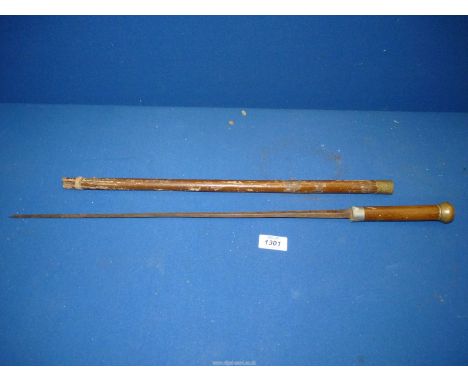 A swagger sword stick with blade by Briqueler. 25" long.****ALL WEAPONS MUST BE COLLECTED IN PERSON - NO POSTAGE. Proof of ag