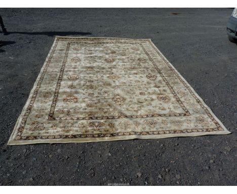 A "Tuscany" Bordered and patterned beige ground Carpet, in all over floral pattern, 133" x 90",
