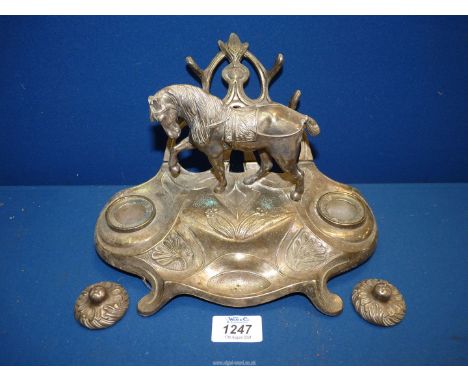A metal Art Nouveau double inkstand with model of a horse to centre, 10" wide x 6" tall.