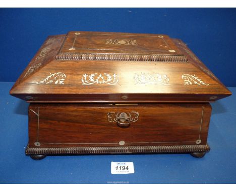 A Mah Jong set in a wooden caddy style case with mother of pearl inlay, William IV type beading and standing on compressed bu