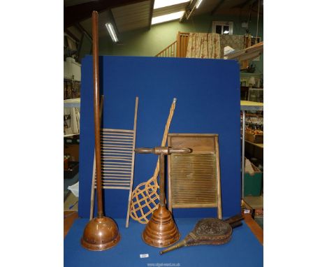A quantity of vintage domestic items to include: two copper washing dollies, two wash boards and a cane carpet beater and a p